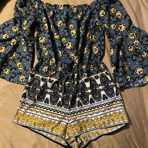 HINT OF BLUSH OFF THE SHOULDER ROMPER MEDIUM